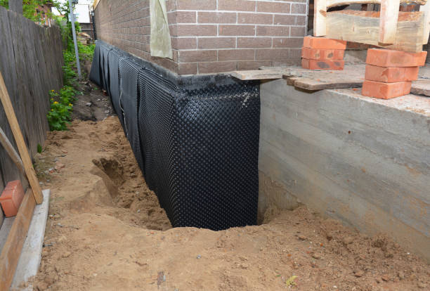SJ Waterproofing Pros technician performing targeted Waterproofing assessment in Appleton, NY